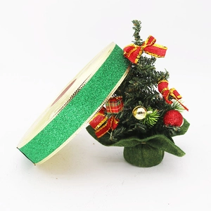 Sparkling green glitter ribbon with gold edges for Christmas tree decor and DIY bows