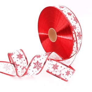 Close-up of red snowflake pattern on 5cm burlap ribbon for Christmas wreath decor