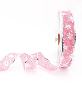 Detail of pink snowflake burlap ribbon with silver glitter edges for Christmas decor
