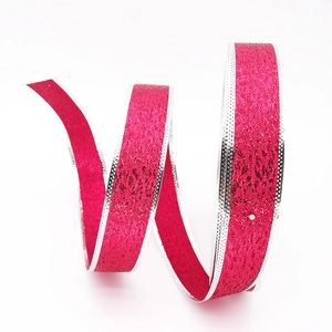 Fuchsia Christmas ribbon with silver metallic edges and sparkling glitter texture