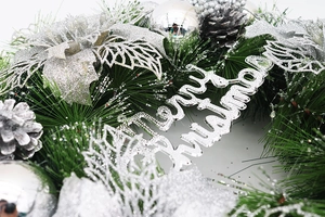 Detail of 35cm Christmas wreath with silver flowers, pine cones and Merry Christmas sign