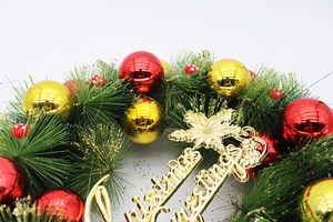 Close-up of 40cm Christmas wreath with red and gold balls and festive greetings sign