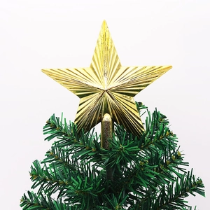Golden 14.5cm five-pointed star tree topper placed on top of a green Christmas tree