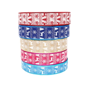 Five rolls of rustic faux linen Christmas ribbons with reindeer and snowflake prints