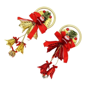 Christmas tree ornaments with Santa Claus figurines, red bows, and festive gold bells