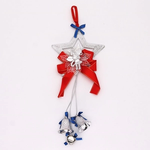 Silver star Christmas ornament with red bow, angel relief, and three small jingle bells