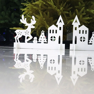 White Christmas silhouette desktop decoration featuring deer and trees with hollow design