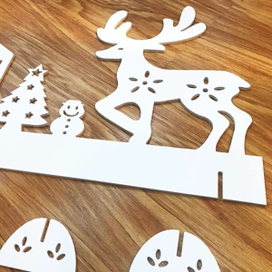 DIY white Christmas tabletop decoration set with reindeer, snowman and tree figurines