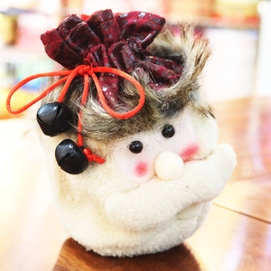 Detailed plush Christmas gift bag with Santa Claus features and velvet drawstring