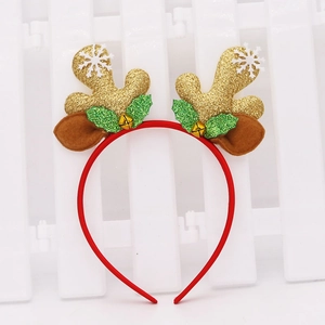 Close-up of Christmas reindeer headband with gold glitter antlers and bells