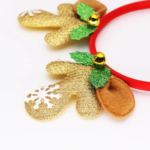 Christmas reindeer headband with gold sequins, red fabric, small bells, and snowflake patterns