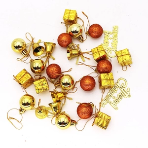 Christmas tree decoration set with golden bells, gift boxes, and Merry Christmas sign
