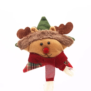 Detailed plush Christmas reindeer hanging ornament with red scarf and green hat