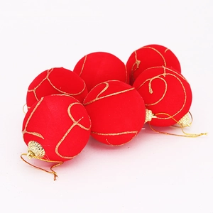 Detail of 6-piece 5cm red flocked Christmas balls with gold glitter patterns