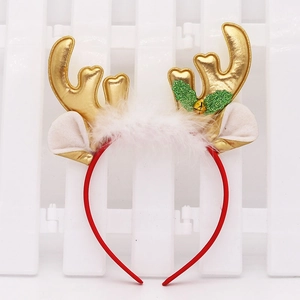 Detail of Christmas reindeer antler headband with gold sequins, faux fur, and a bell