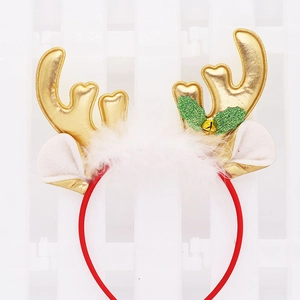 Detail of gold reindeer antlers headband with white faux fur and small yellow bell decor