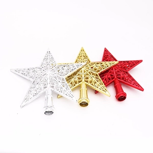 Detailed hollow Christmas tree toppers in gold, silver and red finishes with cutout patterns