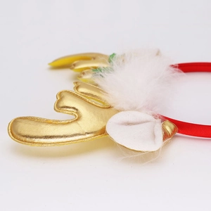 Christmas reindeer antler headband with festive golden sequins and white plush fur detail