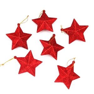 Set of six red glitter star Christmas ornaments with gold hanging strings for tree decoration
