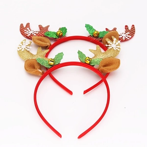 Detail von Weihnachts-Haarreifen mit Glitzer-Geweihen, Stechpalmen und Goldglöckchen