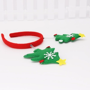 Christmas headband with spring-loaded green trees and white snowflakes on a red band