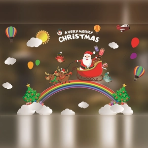 Colorful Santa Claus on reindeer sleigh window clings with rainbow and Christmas trees