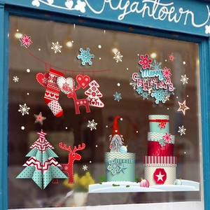 Christmas window decals with Santa, reindeer, and snowflakes for holiday glass decoration