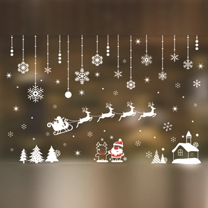 White Christmas window static stickers featuring Santa, reindeer, and snowflakes for decor