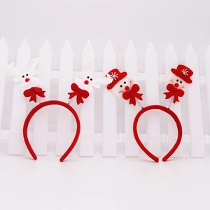 Detail of Christmas reindeer and snowman headbands with festive spring action design