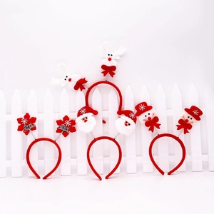 Detail of Christmas headbands set featuring reindeer, Santa, and snowman festive designs
