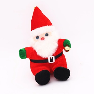 Close-up of red plush Santa Claus doll with gold bell and soft white beard details