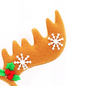 Christmas reindeer antler headband with brown felt, white snowflakes and red berry details