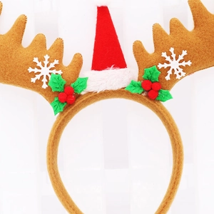 Christmas reindeer antler headband with festive red mini hat and white snowflake details