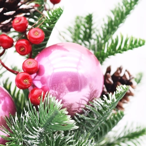 Pink and red Christmas tree picks with glossy ornaments, red berries, and pine needles