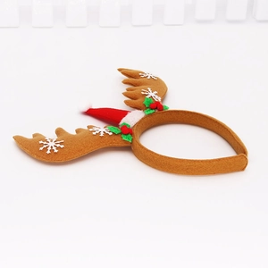 Brown reindeer antler headband with festive red Santa hat and berries for Christmas party