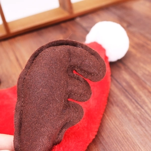 High-quality plush Christmas hat with brown felt reindeer antlers and white pom-pom detail
