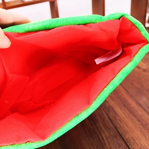 Red and green Christmas elf hat featuring a festive plaid pattern and fuzzy pompom detail