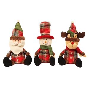Three Christmas plush toys: Santa Claus, Snowman, and Reindeer in plaid fabric on white background