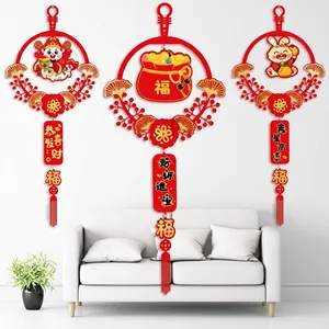 Chinese New Year velvet hanging decorations with traditional tassels and festive patterns
