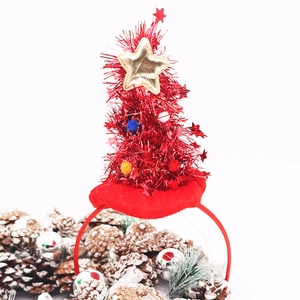Light-up Christmas tree headband with red sequins, colorful pom-poms and gold star topper