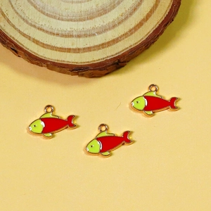 Detailed view of red and green fish alloy charms for DIY jewelry making accessories
