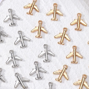 Colgantes de avión en plata y oro para creación de joyas y accesorios DIY