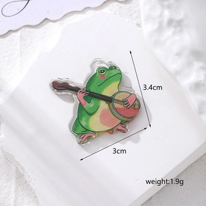 Makroaufnahme eines 3,4 cm Frosch-Anhängers aus Acryl mit Größenangaben und Gewicht