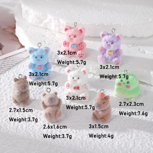 DIY flocked cartoon animal pendants including bears and capybaras with metal rings