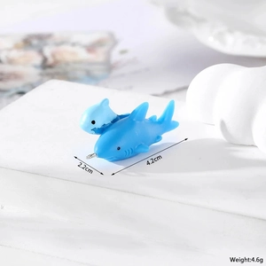Detailed view of resin shark charm with size dimensions for DIY jewelry making