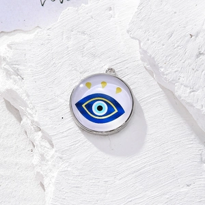 Ciondolo vintage Malocchio in vetro e argento su pietra bianca per gioielli fai-da-te