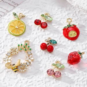 Sparkling rhinestone fruit pendants with lemon cherry and bee floral wreath designs