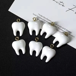 Creative white resin tooth pendants with gold rings for DIY necklaces and earrings