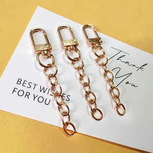 Three rose gold alloy lobster clasps with chains for DIY keychains and bags