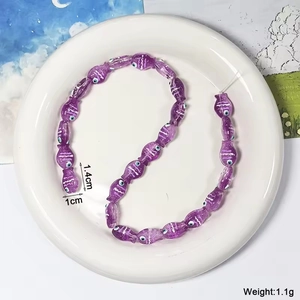 Perlina a forma di pesce viola in vetro per gioielli DIY 1,4x1cm e peso 1,1g